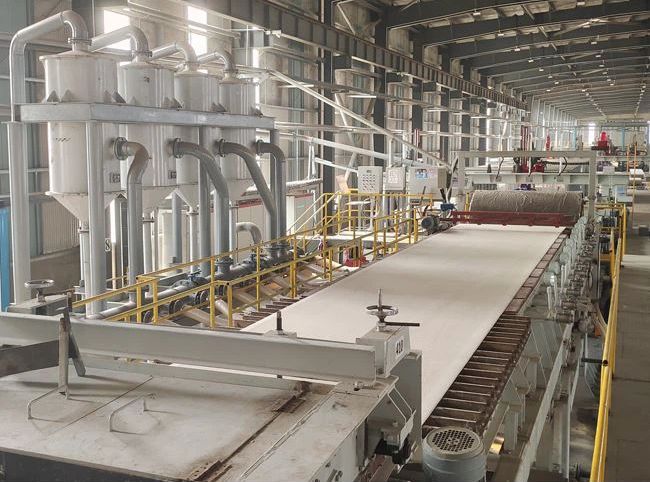 Fibercementpladebehandlingslinje